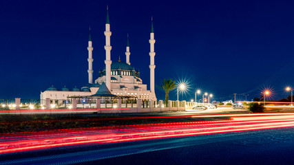 Fototapeta na wymiar Hala Sultan Camii mosque in Nicosia, North Cyprus at night time. Muslim religion.