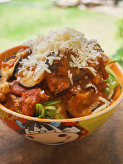 Pasta with tomato sauce and eggplant in a bowl