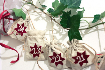 Advent calendar with branches of ivy