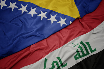waving colorful flag of iraq and national flag of bosnia and herzegovina.