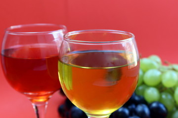 two glasses of wine from different grape varieties