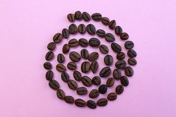 brown roasted coffee beans folded in a spiral