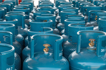 LPG gas bottle stack ready for sell, filling lpg gas bottle - obrazy, fototapety, plakaty
