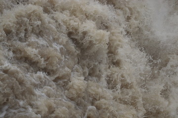 Fototapeta na wymiar flood water from dam gates