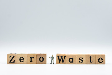 zero waste wooden block  text  with figure man on white background..