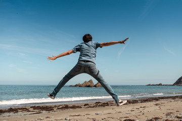 Fototapeta premium Jumping on the beach