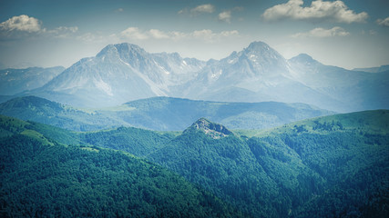 Panoramic view of gorgeous mountain ridge with high rocky peaks