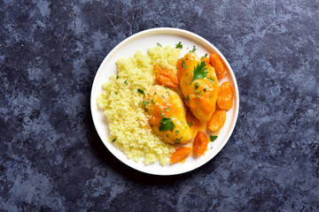 Chicken breasts in apricot sauce and couscous