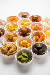Rangoli of Assorted Indian sweets/mithai in bowl for Diwali or any other festivals, selective focus