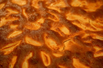 Textured surface of freshly baked apple pie
