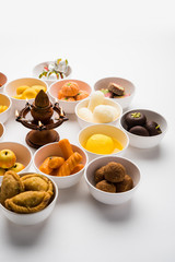 Rangoli of Assorted Indian sweets/mithai in bowl for Diwali or any other festivals, selective focus