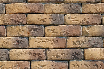 Old brick wall.The wall of colored brick next.