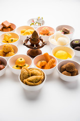 Rangoli of Assorted Indian sweets/mithai in bowl for Diwali or any other festivals, selective focus