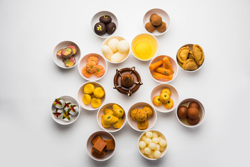 Rangoli of Assorted Indian sweets/mithai in bowl for Diwali or any other festivals, selective focus