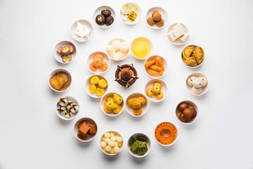 Rangoli of Assorted Indian sweets/mithai in bowl for Diwali or any other festivals, selective focus