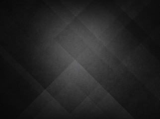 abstract black background with texture and modern geometric pattern design of triangle shapes