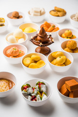 Rangoli of Assorted Indian sweets/mithai in bowl for Diwali or any other festivals, selective focus