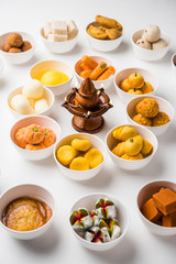 Rangoli of Assorted Indian sweets/mithai in bowl for Diwali or any other festivals, selective focus