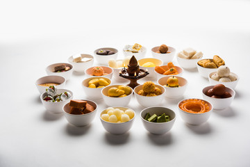 Rangoli of Assorted Indian sweets/mithai in bowl for Diwali or any other festivals, selective focus