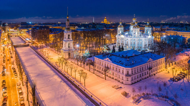 Russia. Saint-Petersburg. Panorama of the evening city with a drone. Winter in St. Petersburg. Nikolsky Cathedral illuminated at night. Kryukov canal. St. Petersburg Orthodox Cathedral.