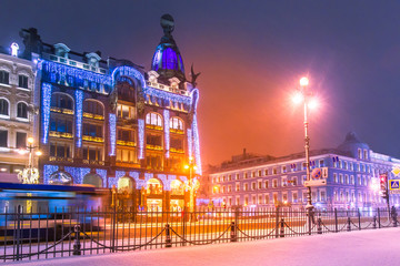 Russia In The Winter.Festival St. Petersburg. Streets Of St. Petersburg. New year. Christmas. Nevsky prospekt. Zinger's House. House of books. The city is decorated with garlands.Winter trip to Russia
