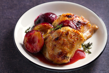 Chicken thighs and plums in ginger, honey and red wine sauce with thyme