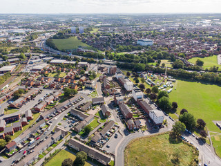 Obraz premium Aerial photo of the British town of Leeds in West Yorkshire UK, showing the Leeds City Centre taken with with a drone on a bright sunny day in the town of Holbeck near to the centre.