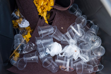 Used plastic glass for drinking in Recyclable garbage - Environmental plastic pollution issue in new world