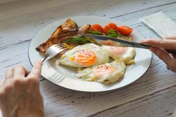 Morning breakfast - scrambled eggs with bacon