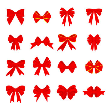Elegant red bows from a wide ribbon. Decor for greeting cards