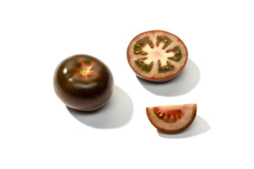 Fresh kumato tomato isolated on white background
