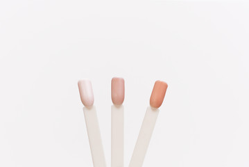 Tips for pastel nail polishes. Palette examples of different colors for nails on a white background.