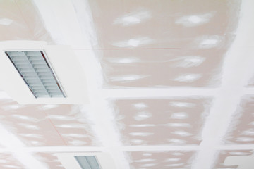 gypsum board ceiling structure and plaster mortar wall painted foundation white decorate interior room in building construction site