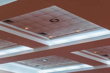 Ceiling gypsum in meeting room dark of business interior office building and light neon