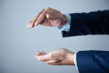 business man empty hand on gray background