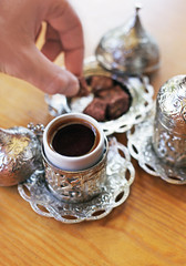 traditional turkish coffee and turkish delight on wooden table