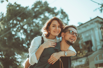 Fototapeta premium Romantic youth concept. Young stylish hipster couple in love at the city.