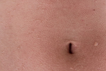 Close up. Navel. The bottom girl's belly