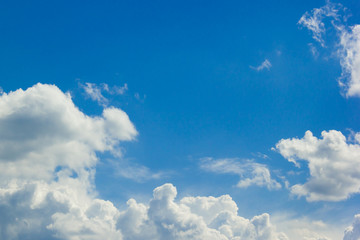 Blue sky and beautiful fluffy cloud. Best summer sky photo background.