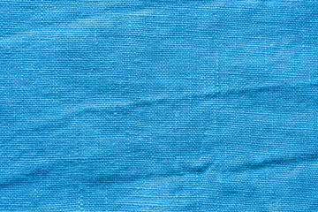 Blue linen cloth texture. Natural fabric material background