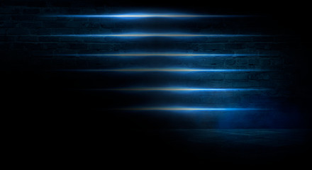 Blue dark background of empty foggy street with wet asphalt, illuminated by a searchlight, laser beams, smoke