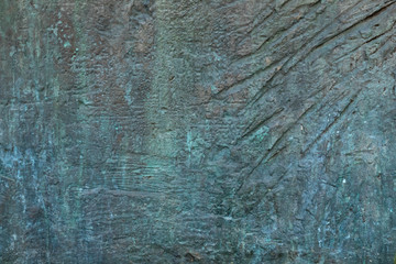 A grunge background made of the sorbed surface of the old stone. Bulges and scratches