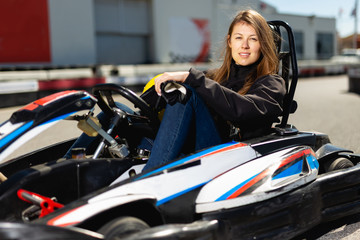 Female driving car for karting