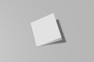 Mockup square booklet, brochure, invitation isolated on a grey background with hard cover and realistic shadow. 3D rendering.