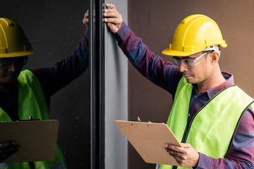 Construction concept , Foreman officer inspector defect about engineer&architect work home building before complete project