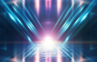 Abstract background. Dark empty stage, multi-colored rays of a neon searchlight, wet asphalt,...