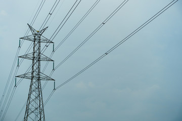 Transmission tower in rainy day, Transmission tower with cloudy sky background.