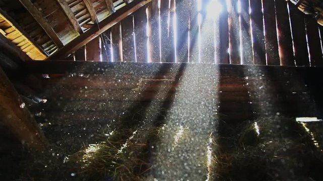 The sun's rays pass through the holes of the old attic HD 1920x1080