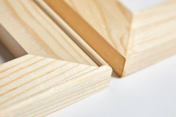 Wooden stretcher bars for canvas, edges of several types, corners closeup