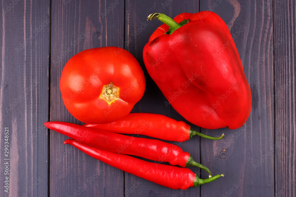 Sticker vegetables in red on a dark background